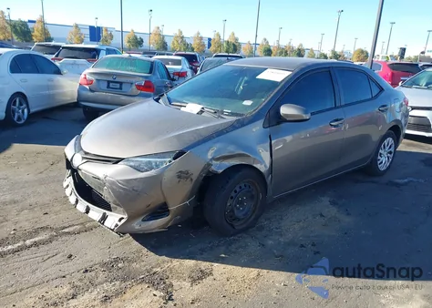2019 Toyota Corolla Le z USA, uszkodzony, nr VIN 5YFBURHE0KP861771